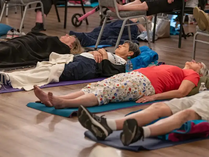 People resting during a sound bath